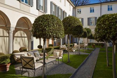 فور اسیسُنز میلانو