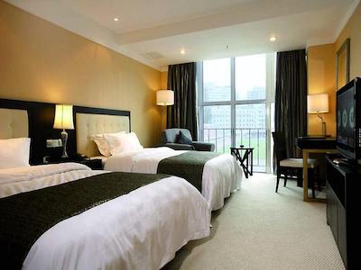 بیجینگ شیهوا بیزنس هتل