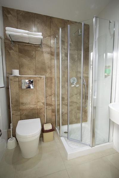 115 د استراند هتل اند سویتز