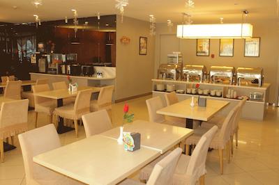 جینجیانگ این بیجینگ گوانگچومن