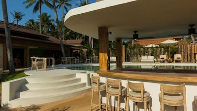 خوان بیچ ریزرت-پول ویلاز اند گلامپینگ هتل