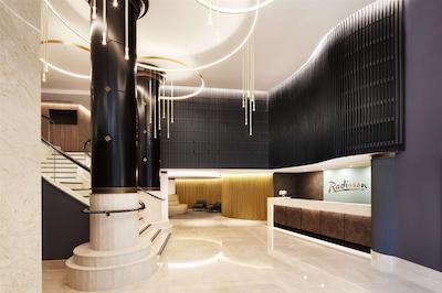 رادیسن هتل اند سویتز اسیدنی