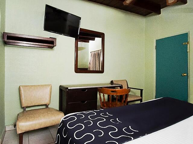 Capital O Hotel América