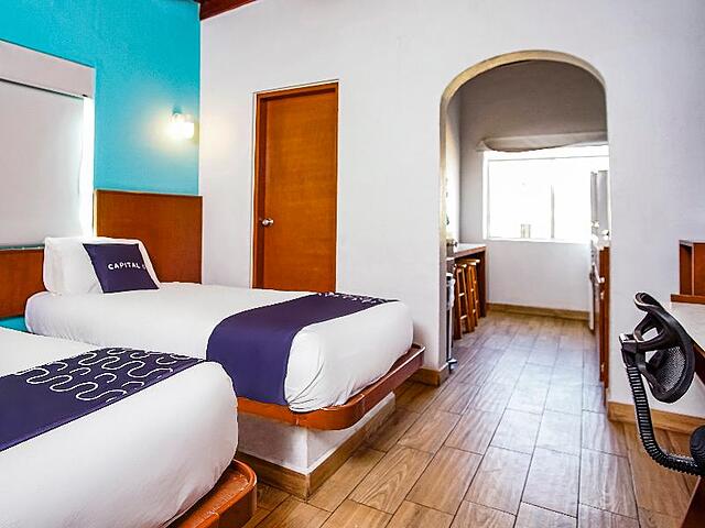 Capital O Hotel América