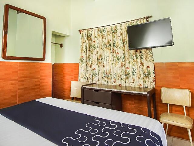 Capital O Hotel América