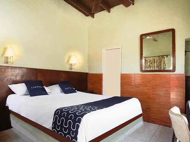 Capital O Hotel América