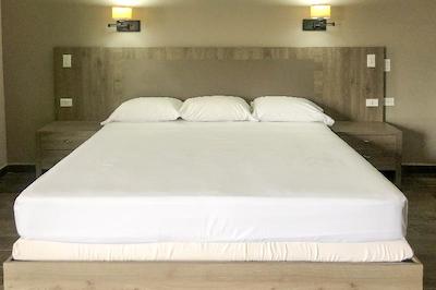 Capital O Palms Hotel