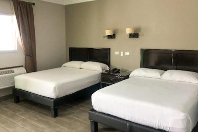 Capital O Palms Hotel