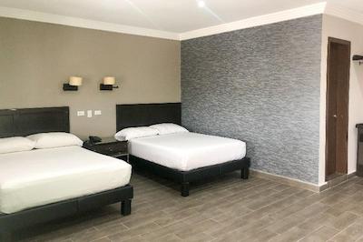 Capital O Palms Hotel