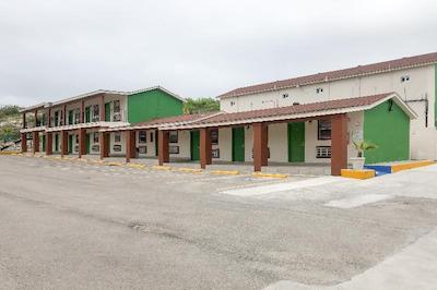 Capital O Palms Hotel