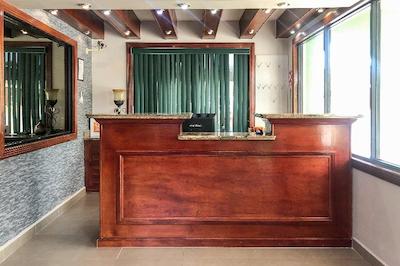 Capital O Palms Hotel