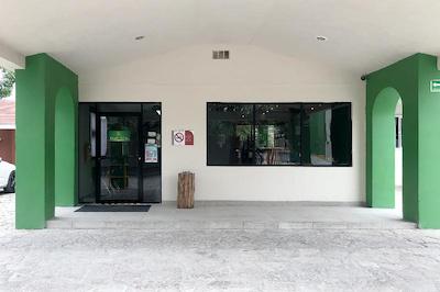 Capital O Palms Hotel