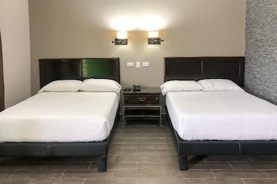 Capital O Palms Hotel