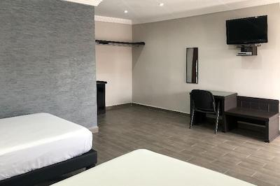 Capital O Palms Hotel