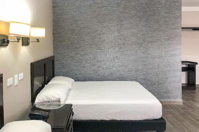 Capital O Palms Hotel