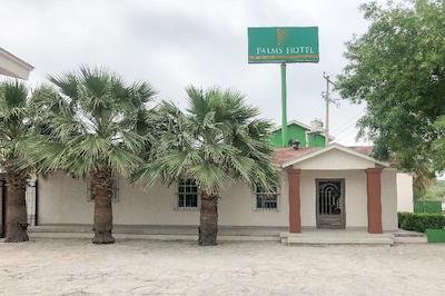 Capital O Palms Hotel