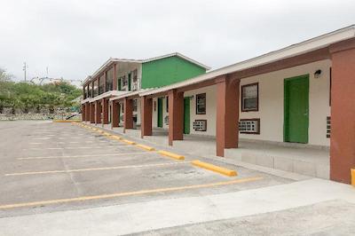 Capital O Palms Hotel