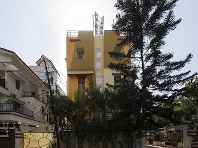 OYO 11566 SHREE SWAMI APARTMENT