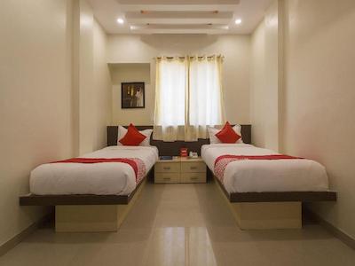 OYO 11566 SHREE SWAMI APARTMENT